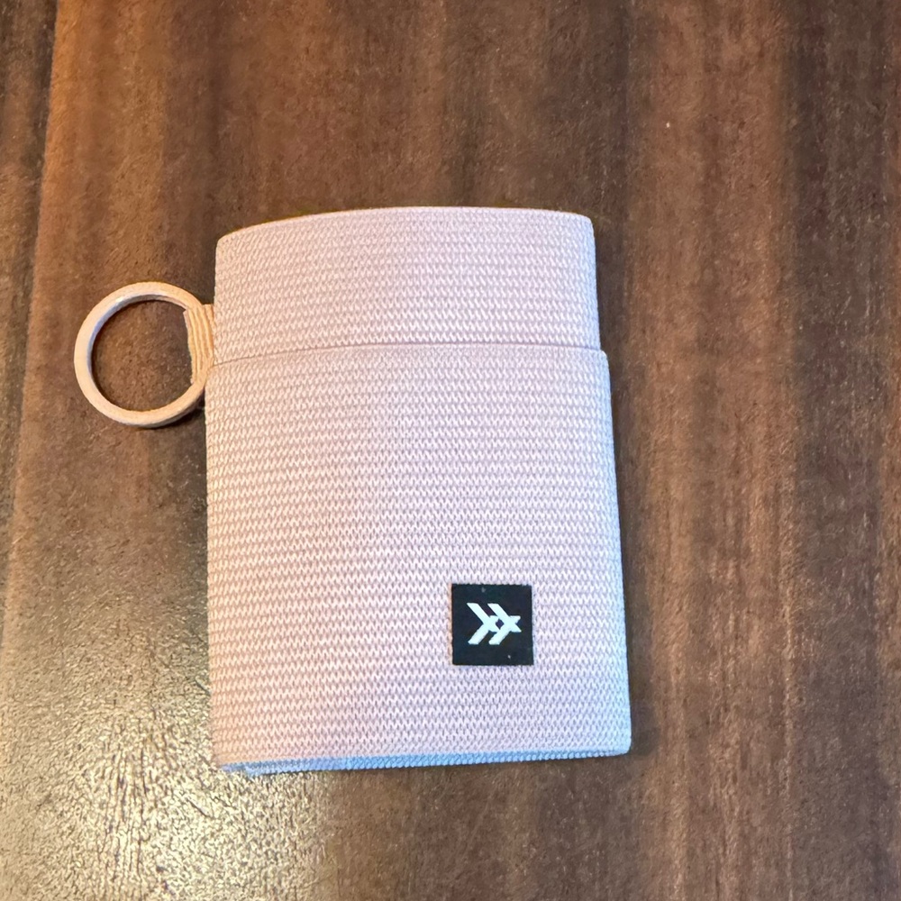 Light pink thread wallet card holder.